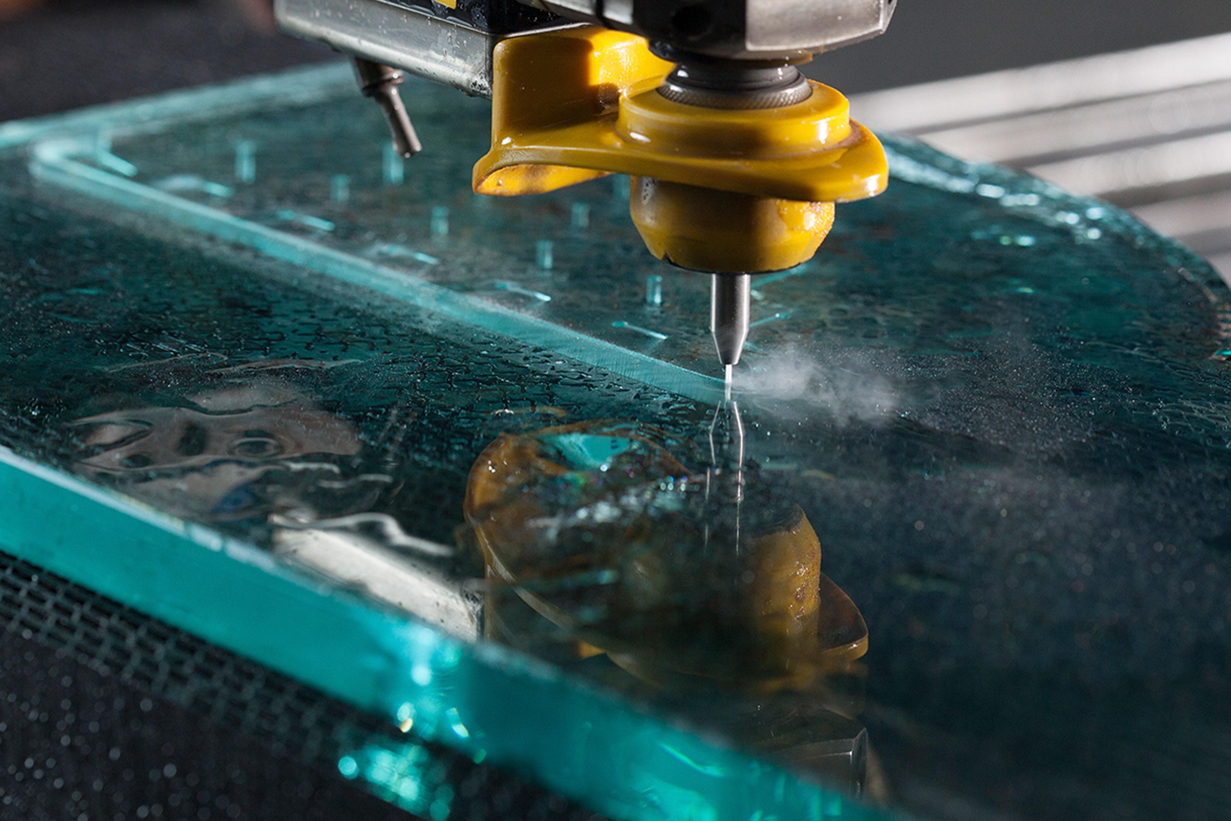 Waterjet cutting stone glass and ceramics with garnet abrasive