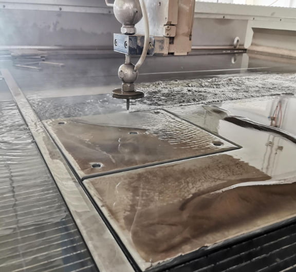 Waterjet cutting of thick metal plate